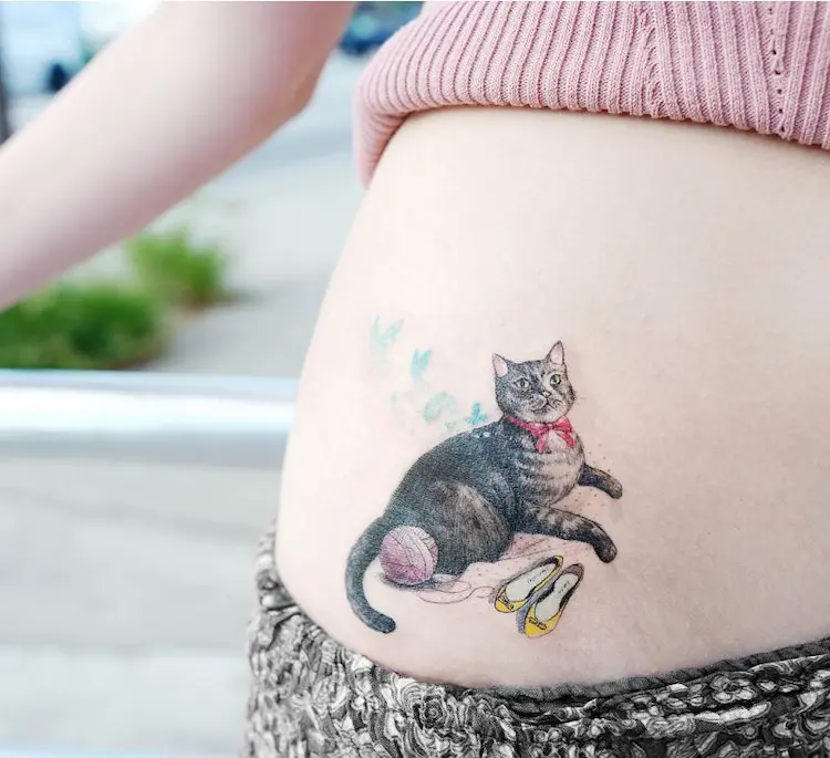 10 Perfect Cat Tattoo Ideas for Your Stomach